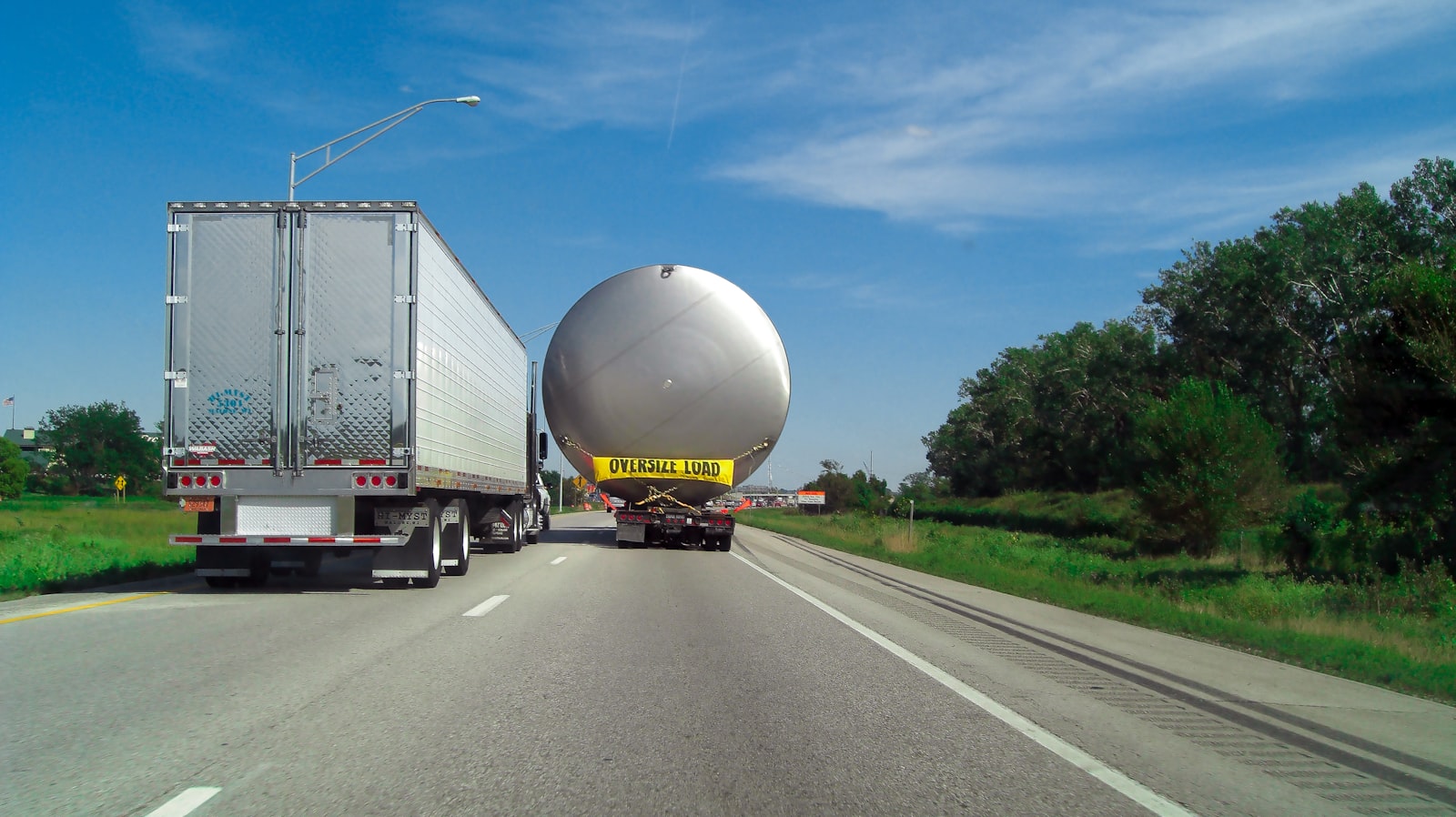 Semi-trucks carrying freight on a highway