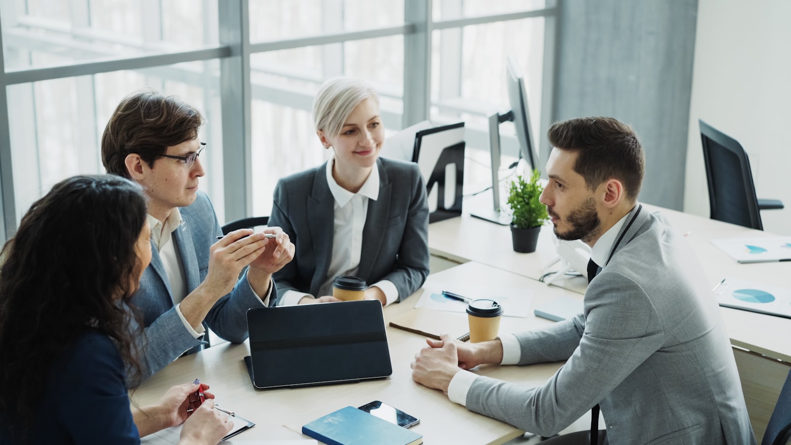 A diverse business team collaborating in a modern office